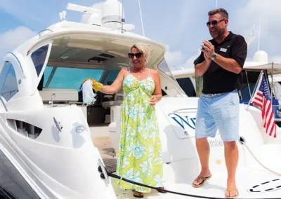 Happy customers just christened their new yacht sold by Bluewater Yacht Sales